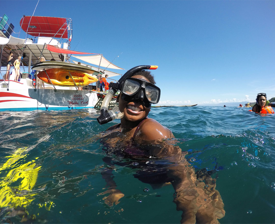 girl on snorkeling tour bay of banderas