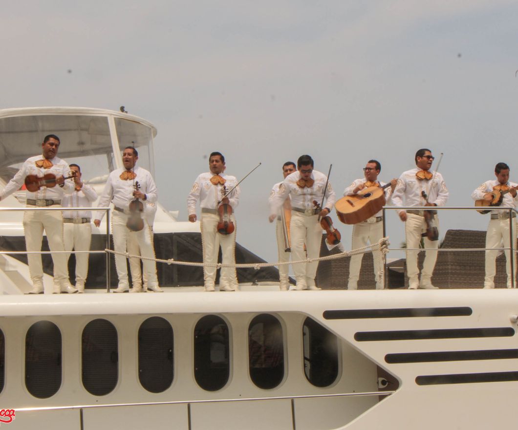 mariachi band playing on private boat party