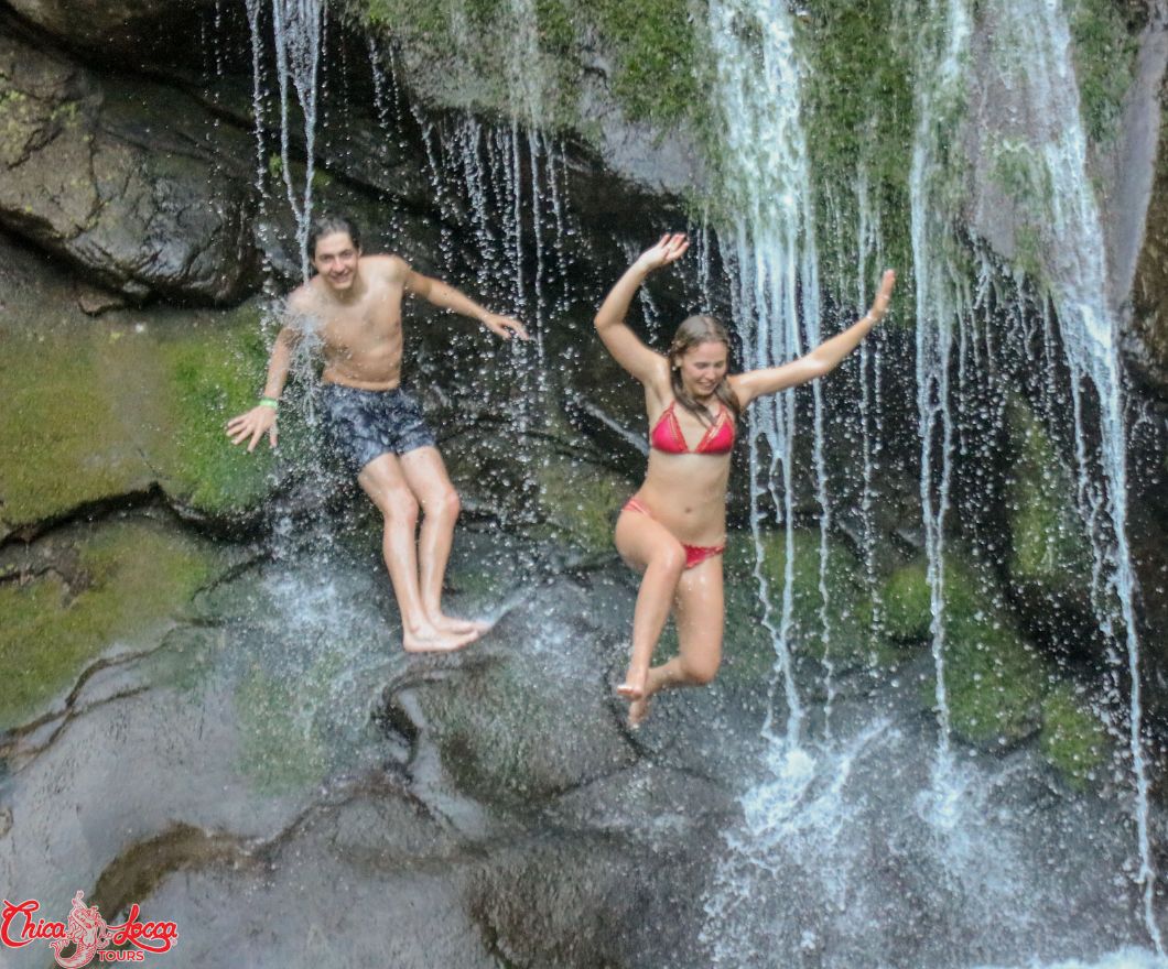 couple jumping in the yelapa falls